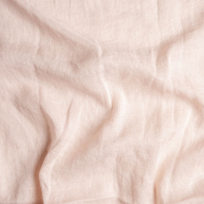 Linen Whisper Swatch Card | Pearl | A close up of linen whisper fabric in pearl, a nude-like, soft rose pink tone.