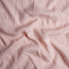Linen Whisper Pillowcase (Single) | Rouge | A close up of linen whisper fabric in rouge, a mid-tone blush pink.