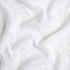 Linen Whisper Baby Blanket | White | A close up of linen whisper fabric in classic white.