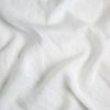 Linen Whisper Yardage | Winter White | A close up of linen whisper fabric in winter white, softer and warmer in tone than classic white.