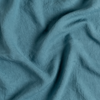 Linen Twin Fitted Sheets | Cenote | A close up of linen fabric in cenote, a vibrant, ocean-inspired blue-green.