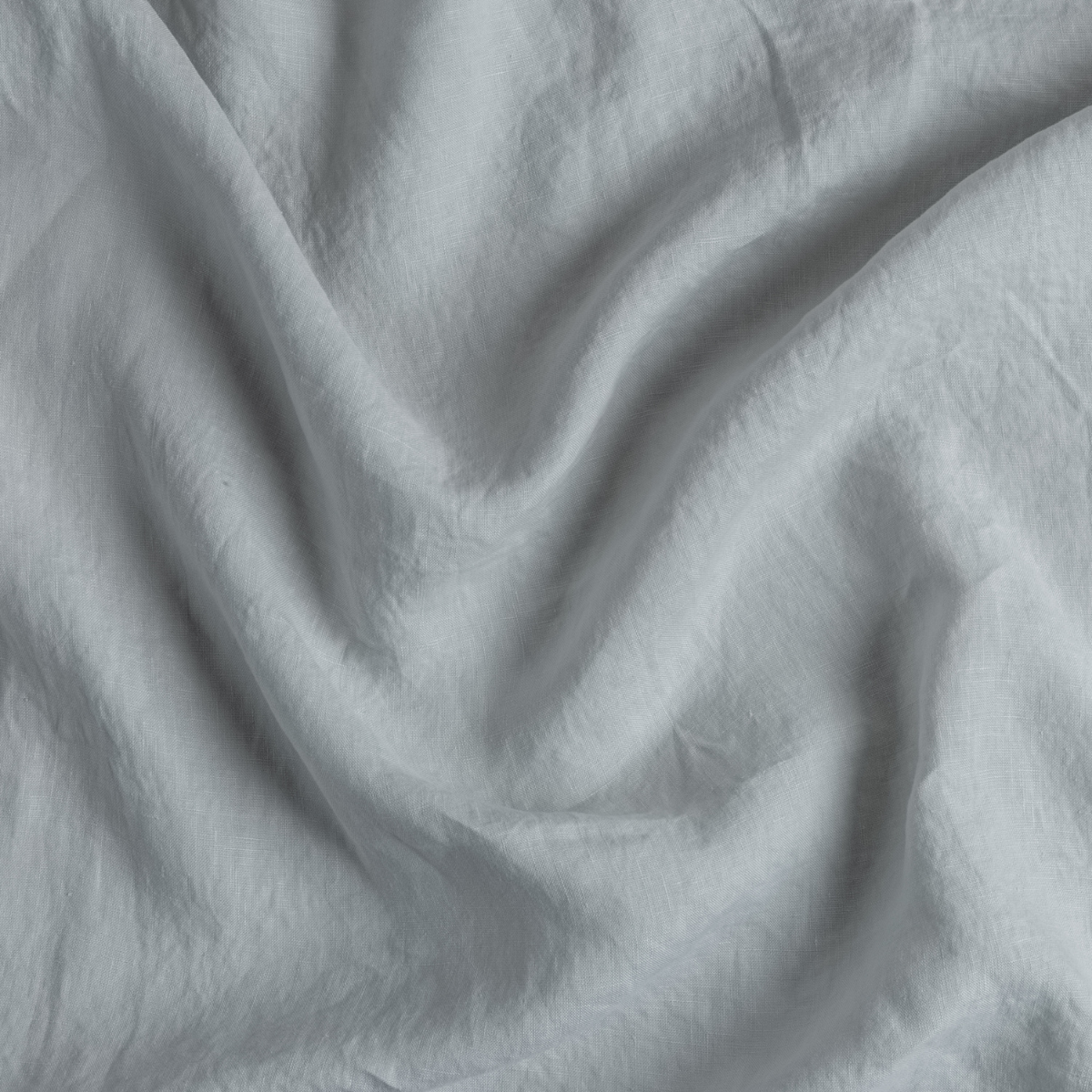 Signature Linen Swatch Card | Cloud | A close up of linen fabric in cloud, a soft, subtle sky blue-grey.