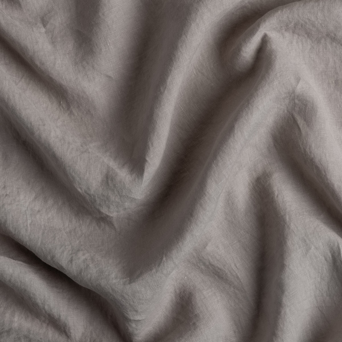 Signature Linen Swatch Card | Fog | A close up of linen fabric in fog, a neutral-warm, soft mid-tone grey.