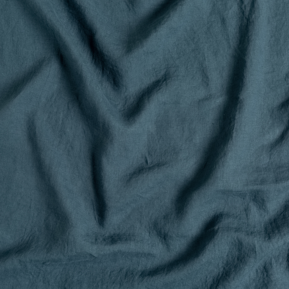 Signature Linen Swatch Card | Midnight | A close up of linen fabric in midnight, a rich indigo tone.