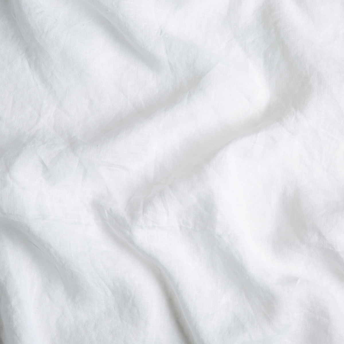 Signature Linen Swatch Card | White | A close up of linen fabric in classic white.