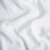 Linen Twin Fitted Sheets | White | A close up of linen fabric in classic white.