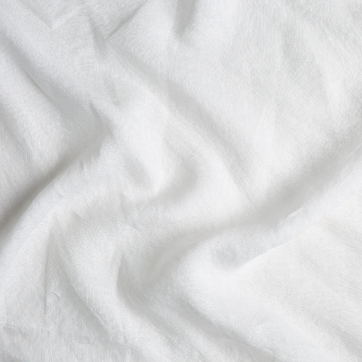 Signature Linen Swatch Card | Winter White | A close up of linen fabric in winter white, softer and warmer in tone than classic white.