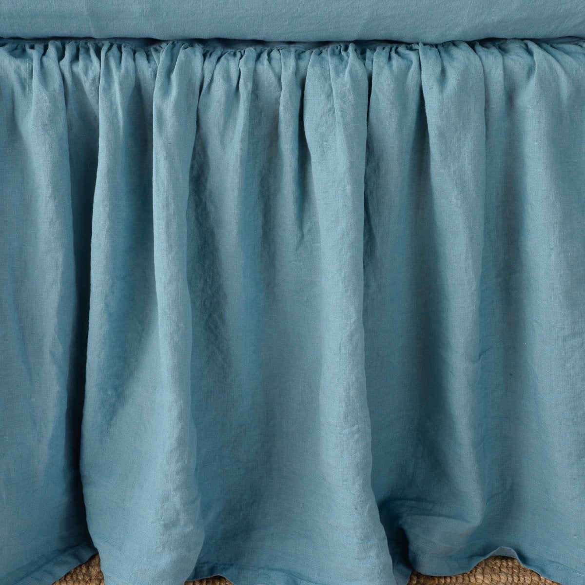 Linen Bed Skirt | Cenote | Close-up of bed skirt, featuring its softly gathered design.