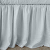 Linen Bed Skirt | Cloud | Close-up of bed skirt, featuring its softly gathered design.