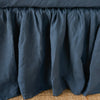 Linen Bed Skirt | Midnight | Close-up of bed skirt, featuring its softly gathered design.