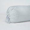 Linen Throw Pillow | Cloud | Close-up bolster end detail, angled view to show gathered closure and satin ties.