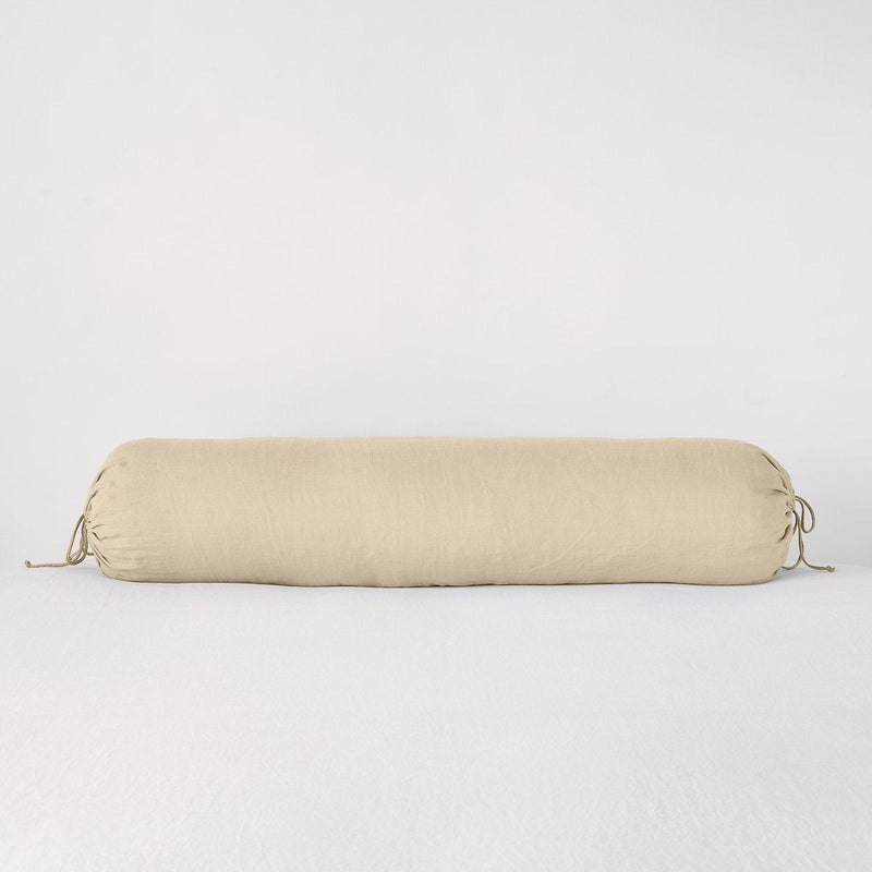 Linen Throw Pillow | Honeycomb | bolster against a white background.