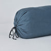 Linen Throw Pillow | Midnight | Close-up bolster end detail, angled view to show gathered closure and satin ties.