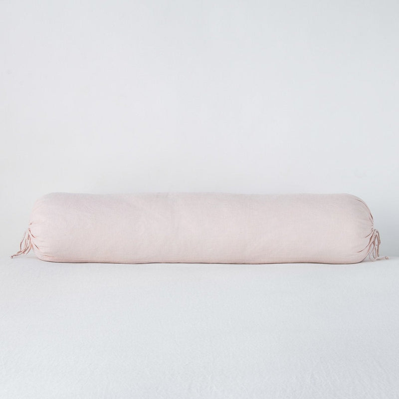Linen Throw Pillow | Pearl | bolster against a white background.