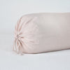 Linen Throw Pillow | Pearl | Close-up bolster end detail, angled view to show gathered closure and satin ties.