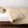 Linen Twin Duvet Cover | Honeycomb | duvet cover neatly folded back over white linen sheeting - side view.