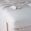 Linen Twin Fitted Sheets | Pearl | close up of fitted sheet with matching rumpled flat sheet - corner view.