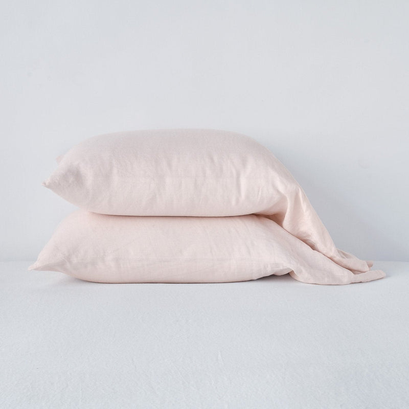 Linen Pillowcase (Single) | Pearl | Two sleeping pillows neatly stacked against a white background - side view.