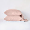 Linen Pillowcase (Single) | Rouge | Two sleeping pillows neatly stacked against a white background - side view.
