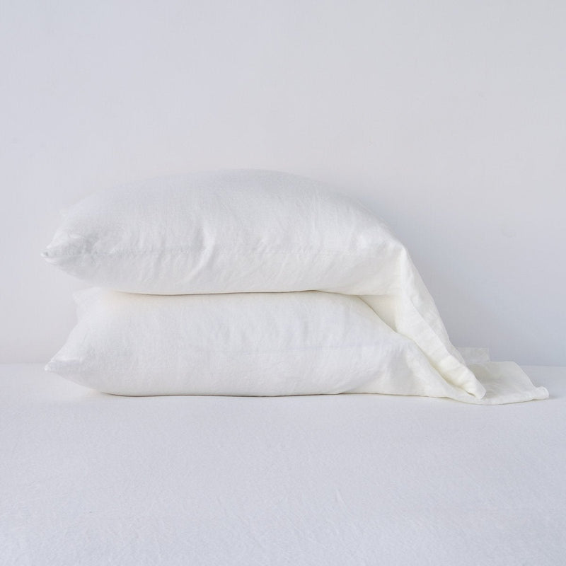Linen Pillowcase (Single) | Winter White | Two sleeping pillows neatly stacked against a white background - side view.