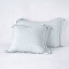 Linen Sham | Cloud | Two shams leaning upright against a white background.