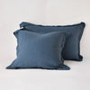 Linen Sham | Midnight | Two shams leaning upright against a white background.