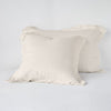 Linen Sham | Parchment | Two shams leaning upright against a white background.