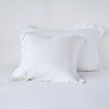 Linen Sham | White | Two shams leaning upright against a white background.
