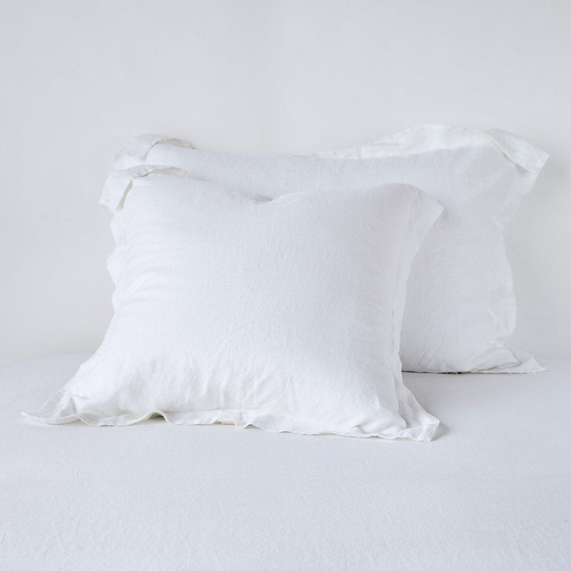 Linen Sham | White | Two shams leaning upright against a white background.