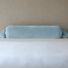 Loulah Throw Pillow | Cloud | bolster shown against neutral background and white foreground