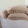 Loulah Sham | Pearl | Two shams stacked flat next to matching bolster. Close-up side view highlights the ruffle trim.
