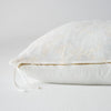 Lynette Throw Pillow | Winter White | Close-up side vew featuring brass zipper with charmeuse pull and linen back.