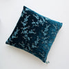Lynette Throw Pillow | Cenote | pillow against a plain background - overhead view.