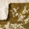Lynette Blanket | Honeycomb | Close up of blanket, with a corner turned back to showcase the linen back - overhead view.