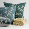 Lynette Throw Pillow | throw pillows and blanket from the lynette collection shown against a white background.