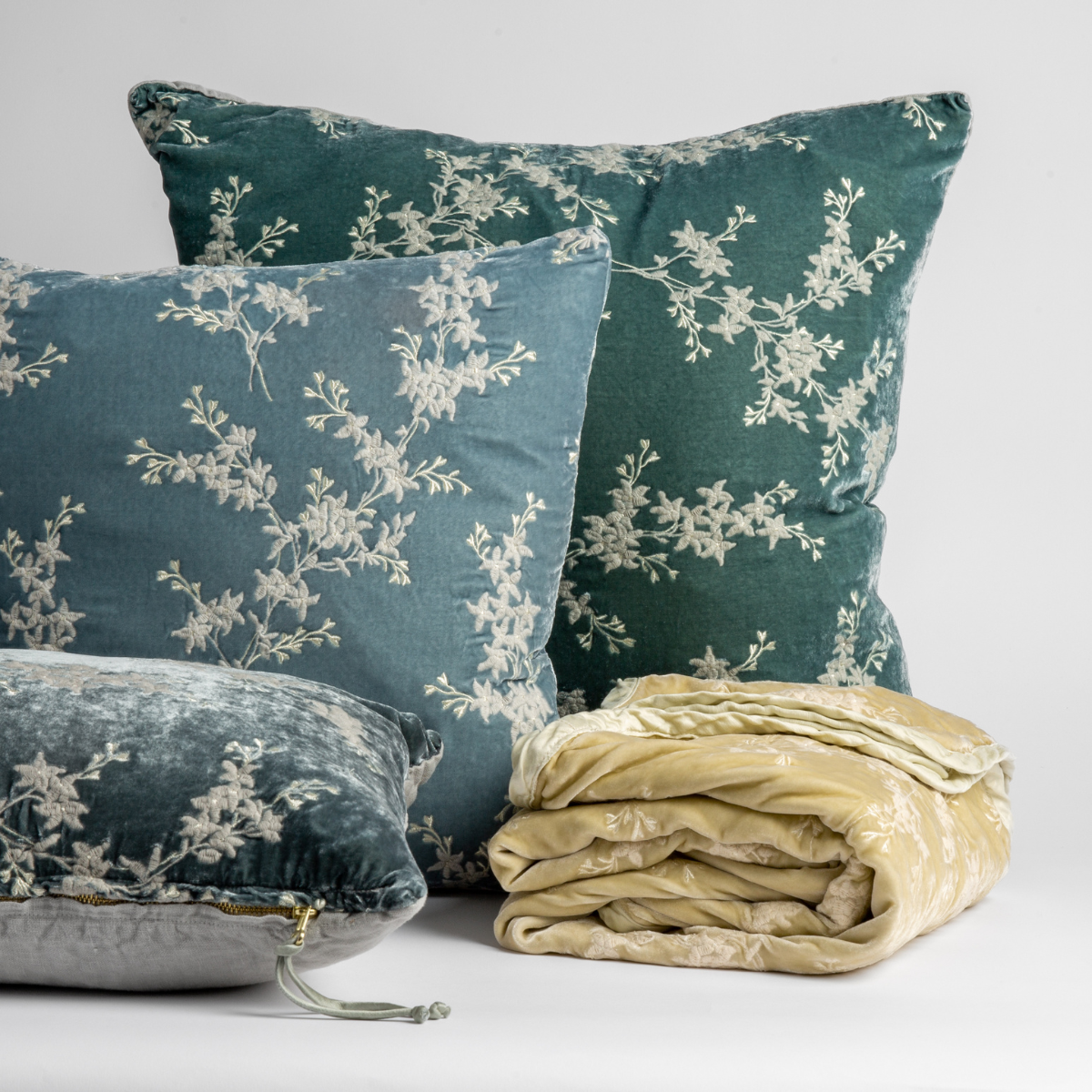 Lynette Blanket | throw pillows and blanket from the Lynette collection shown against a white background. 