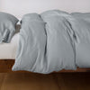 Madera Luxe Twin Duvet Cover | Mineral | duvet cover with matching sleeping pillow and fitted sheet - side view.