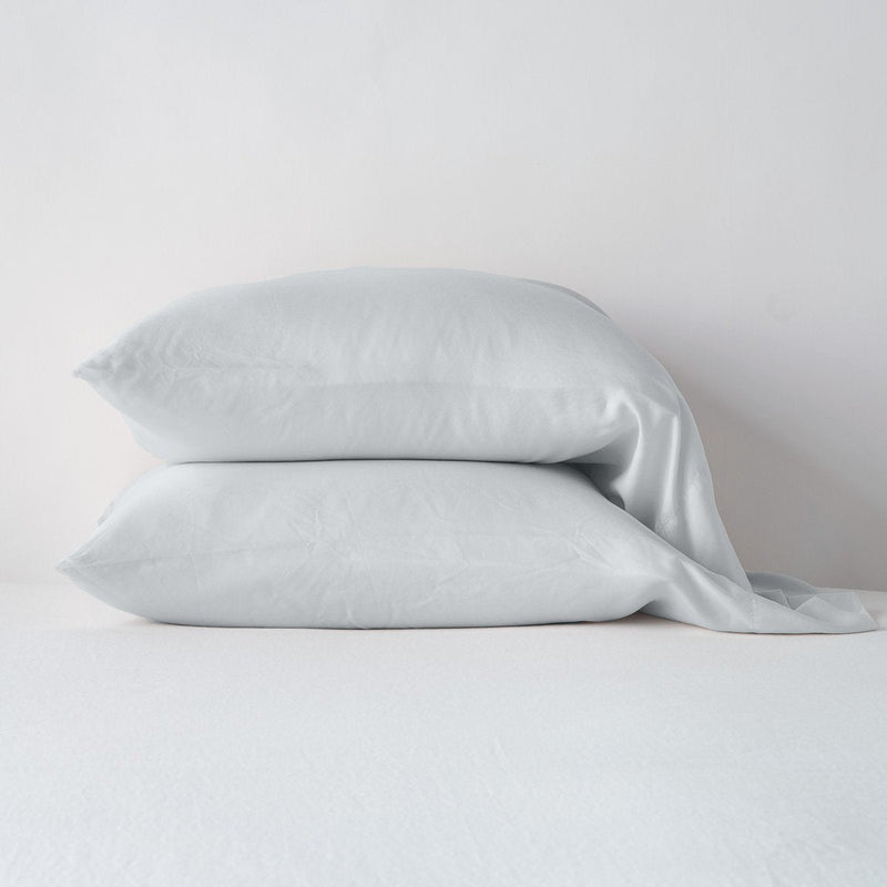 Madera Luxe Pillowcase (Single) | Cloud | sleeping pillows stacked neatly against a white backdrop - side view.