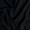 Austin Sham | Corvino | A close up of midweight linen fabric in Corvino, a black tone.