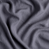 Austin Bed Skirt | French Lavender | a close up of midweight linen fabric in french lavender, a neutral violet tone.