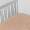 Mirabella Crib Sheet — Limited Release | Rouge | a silk and tencel™ crib sheet shown slightly overhread and shot into the corner of a white crib.