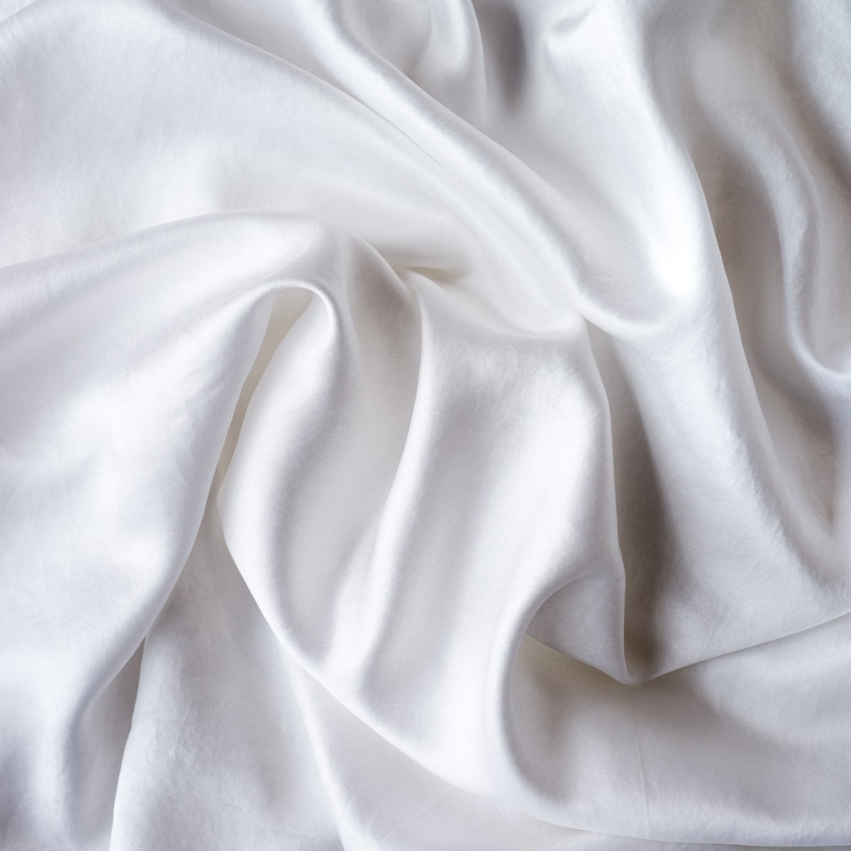 Seraphina Swatch Card | White | A close up of our silk-Tencel™ blend, in white.