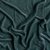 Carmen Baby Blanket | Eucalyptus | A close up of silk velvet fabric in eucalyptus, a soft light green.