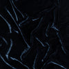 Carmen Baby Blanket | Midnight | A close up of silk velvet fabric in midnight, a rich indigo tone.