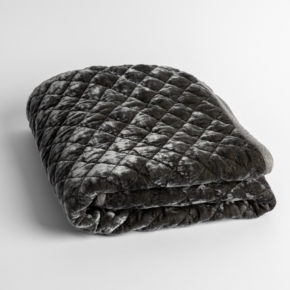 Silk Velvet Quilted Baby Blanket | Fog | a folded quilted silk velvet baby blanket shown from overhead to showcase quilting  pattern and texture.