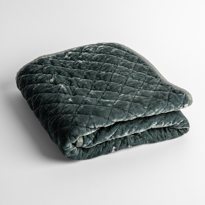 Silk Velvet Quilted Baby Blanket | Mineral | a folded quilted silk velvet baby blanket shown from overhead to showcase quilting  pattern and texture.