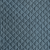 Silk Velvet Quilted Blanket | Cloud | A close up of quilted silk velvet fabric in cloud, a soft, subtle sky blue-grey.