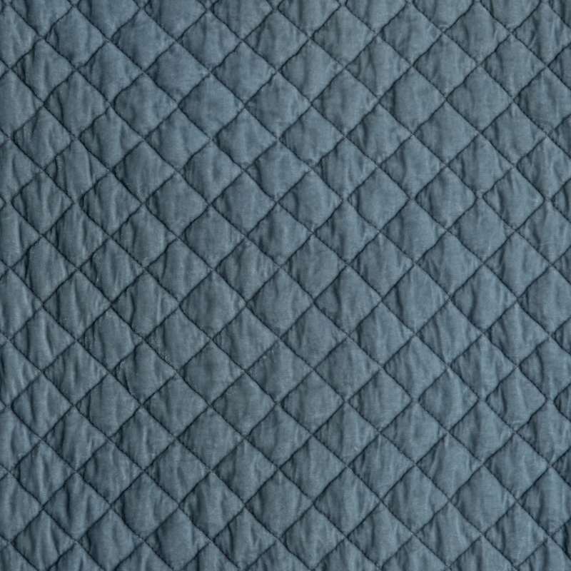 Silk Velvet Quilted Baby Blanket | Cloud | A close up of quilted silk velvet fabric in cloud, a soft, subtle sky blue-grey.