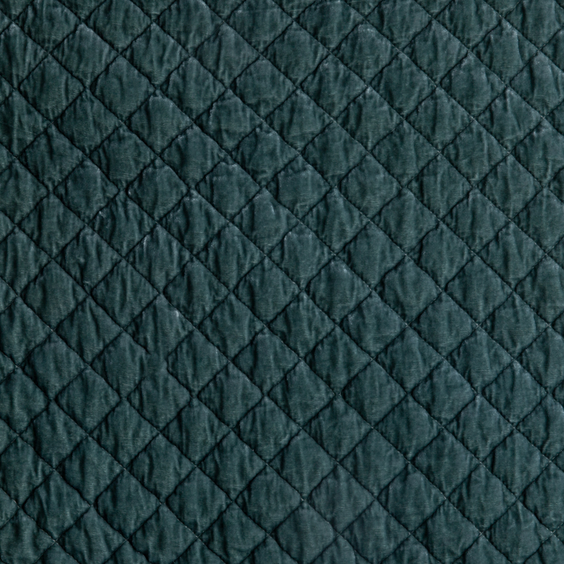 Silk Velvet Quilted Blanket | Eucalyptus | A close up of quilted silk velvet fabric in eucalyptus, a soft light green.
