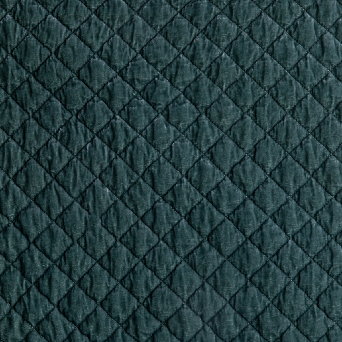 Silk Velvet Quilted Coverlet | Eucalyptus | A close up of quilted silk velvet fabric in eucalyptus, a soft light green.